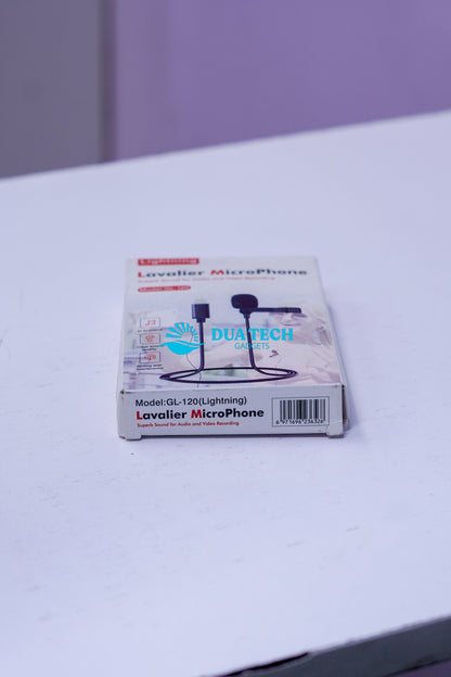Box of a lavaliere microphone on a white surface with a purple background