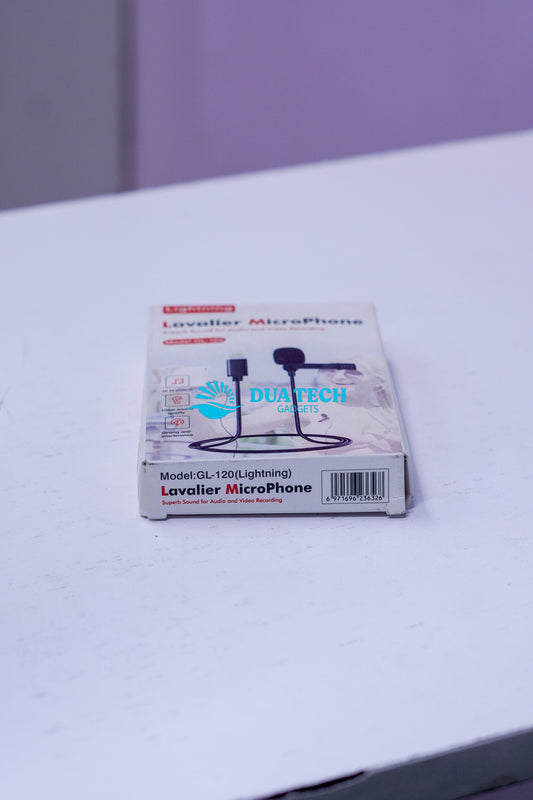 Box of a lavaliere microphone on a white surface with a purple background